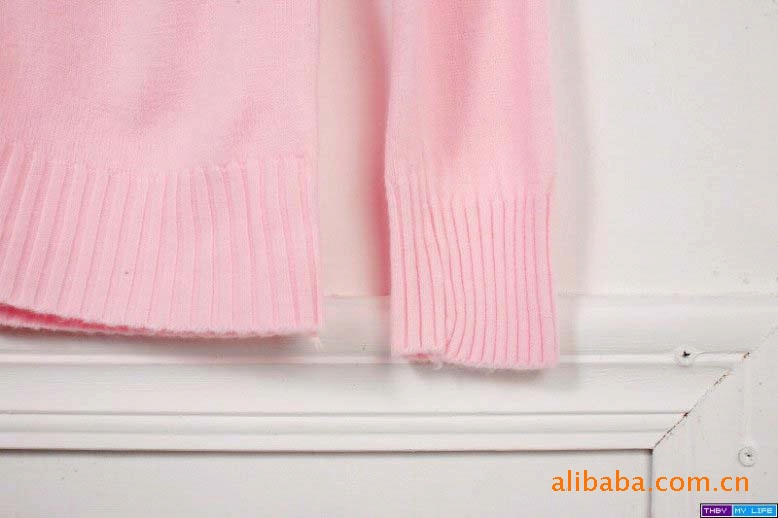 批发供应瑞丽女式纯色长袖<em>珍珠扣开衫</em>毛衣TH