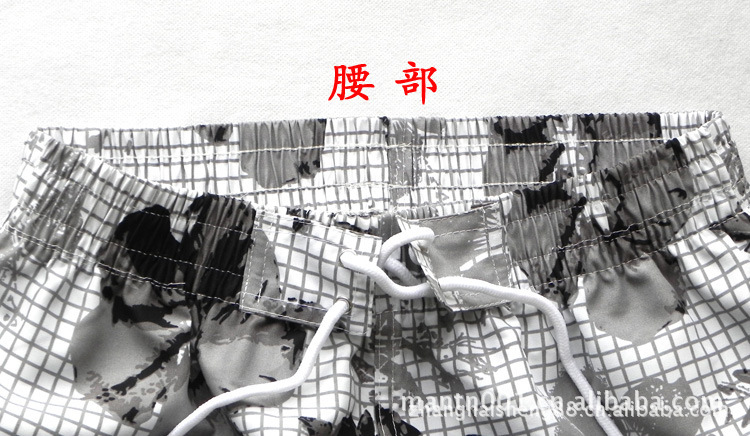 <em>淘宝格子</em>大花热裤沙滩裤批发 <em>男式短裤</em> 女士情