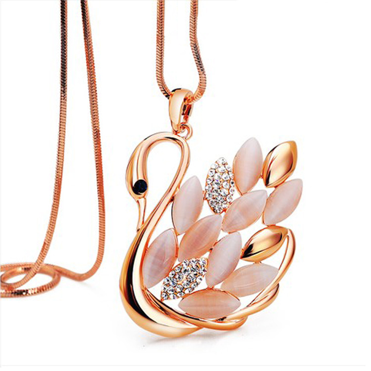 锦尚饰品韩版新品高档猫眼石天鹅<em>毛衣链</em>清新长