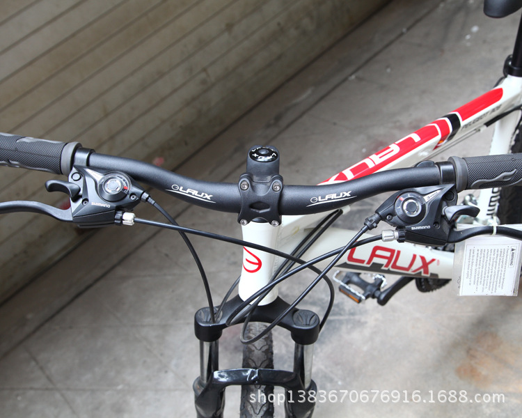 厂家热销laux/雷克斯 标致308 26变速 山地自行车 前后油压碟刹