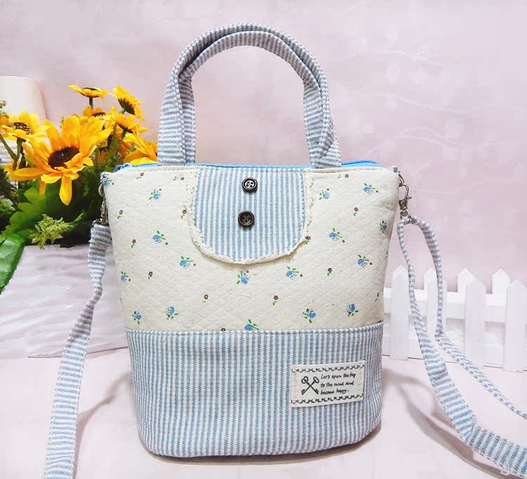 豎條紋花朵雙扣單拉手提斜挎包