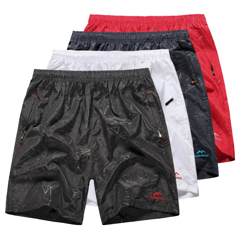 男士运动<em>短裤</em>拉链口袋不规则印花涤纶<em>休闲短裤</em>