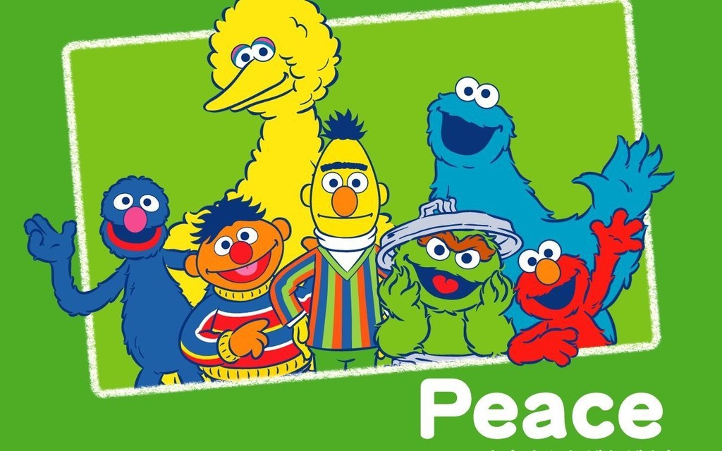 关於芝麻街 艾摩(elmo 贪玩的3岁男怪兽,声音清亮,笑声非常有感染