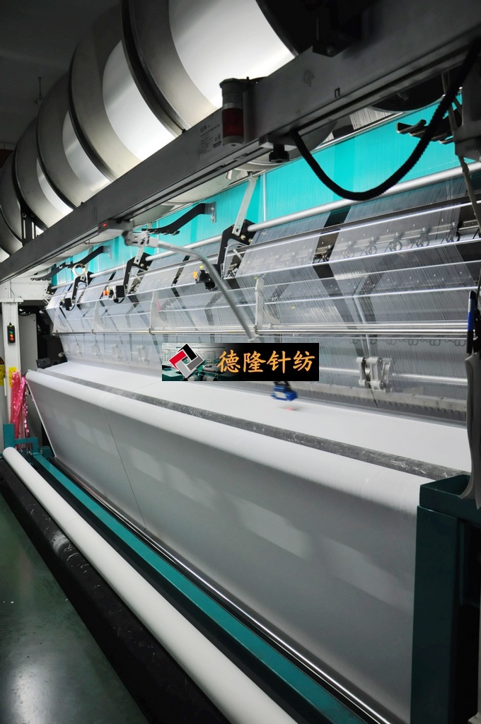 10台经编机全部安装全电脑控制的红外线自停装置