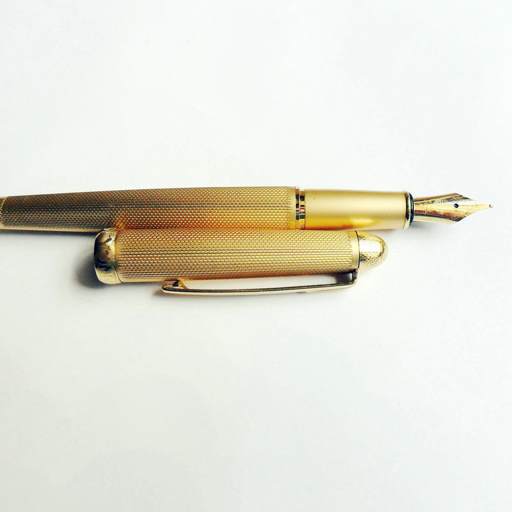 高档正品正品永生金色旋转抽墨式钢笔