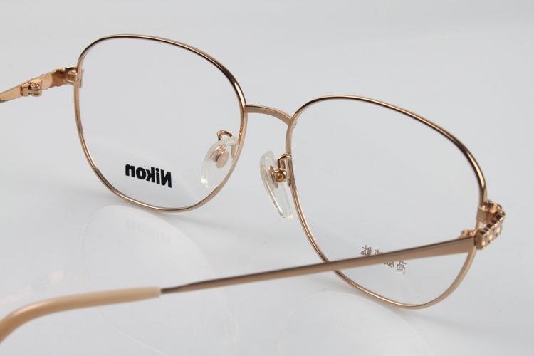 尼康 纯钛 尾单处理 全框金色眼镜架 大框男士眼镜框 商务镜框图片_7