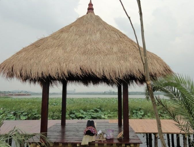 2013年茅草凉亭凉亭木屋定制设计生产安装